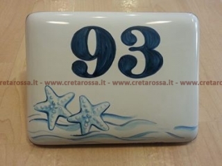 cod.art: nc72 - Mattonella in ceramica 17x13 leggermente bombata circa con decoro stelle marine e scritta personalizzata. 